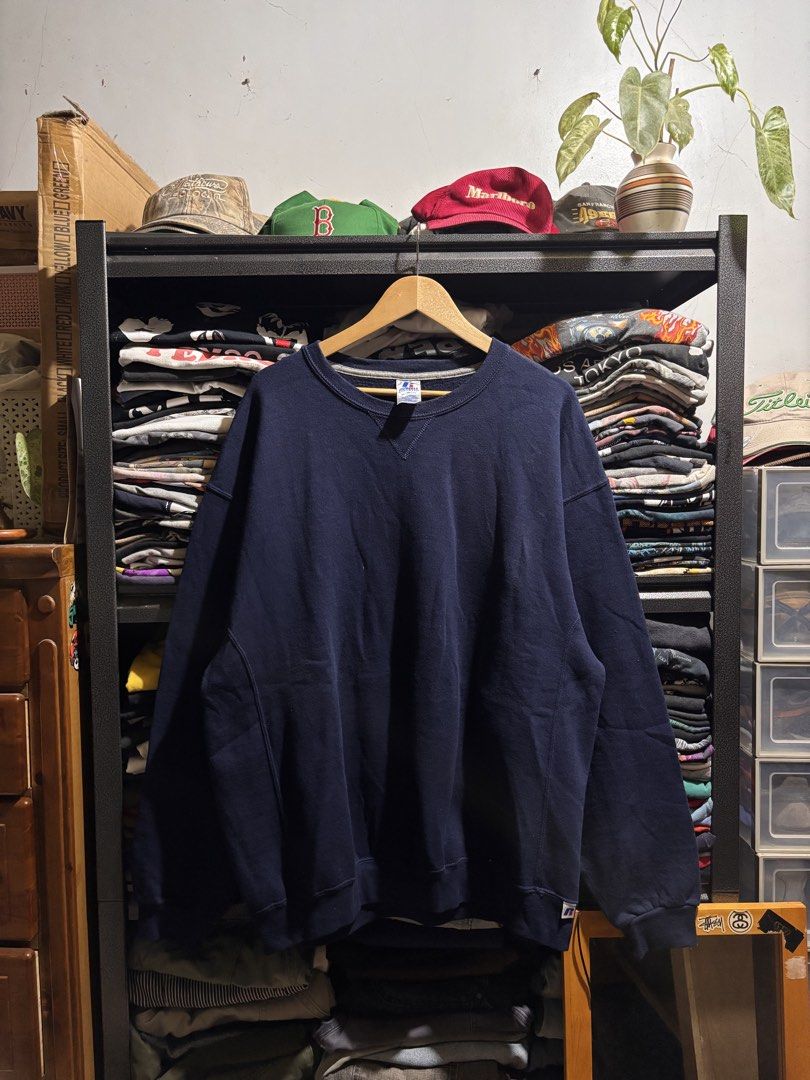 Russell Athletic Navy Blue Sweatshirt XL (Category: Coats, Jackets and Outerwear) located in General Santos City (Dadiangas). Submitted by andrei_ciocon (Listing ID 1468376412, Image 1). Description: - Brand: Russell Athletic - Dimes: 26w / 29l - Color: Solid Navy Blue - Size: XL - Material: 50% Cotton, 50% Polyester (Soft fleece interior) - Features: Classic crewneck, signature 'V' stitch at collar, ribbed side panels, and logo tag on left cuff 