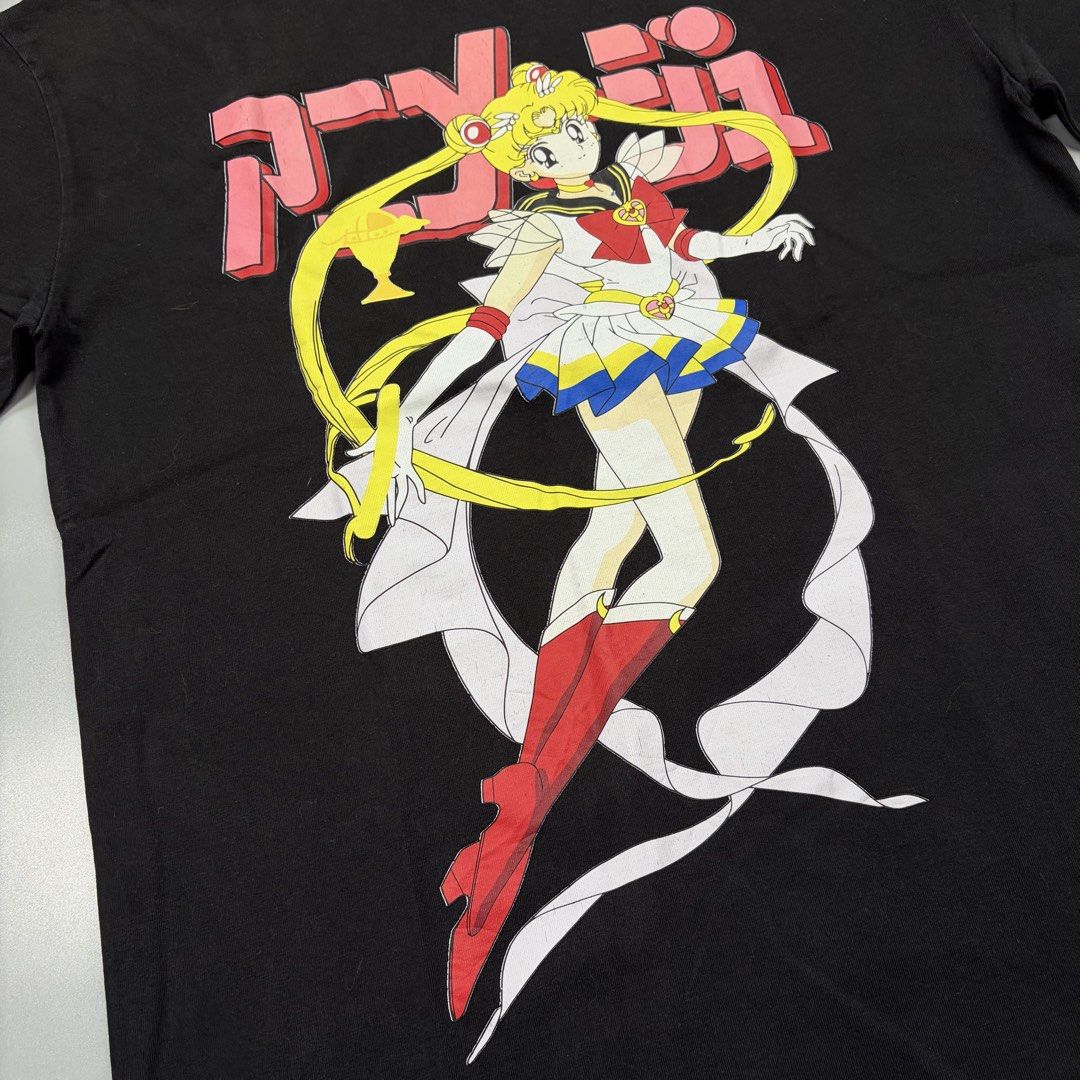 Sailor Moon Custom Shirt (Category: Activewear) located in Cavite. Submitted by onebeancent (Listing ID 1468430468, Image 2). Description: Size: Medium Dimension: 20" Width | 28" Length Color: Black Color Rate: 9.8/10 Issue: None Condition: Almost New‼️ Price: 500php Additional Shipping Fee (J&T Small Pouch) 75php Luzon 100php visayas 120php mindanao.