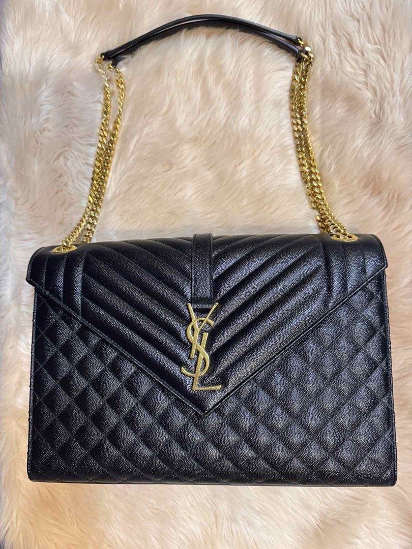 Saint Laurent College Monogram Bag Black Gold Hardware (Category: Luxury Bags & Wallets) located in Porac. Submitted by goldenforest_ae5e0c (Listing ID 1468286244, Image 1). Description: - Brand: Saint Laurent (YSL) - Material: Premium black leather with chevron and diamond quilting - Hardware: Sophisticated gold-tone YSL monogram logo - Strap: Double chain strap with comfortable leather shoulder pads - Closure: Secure magnetic snap under the fro