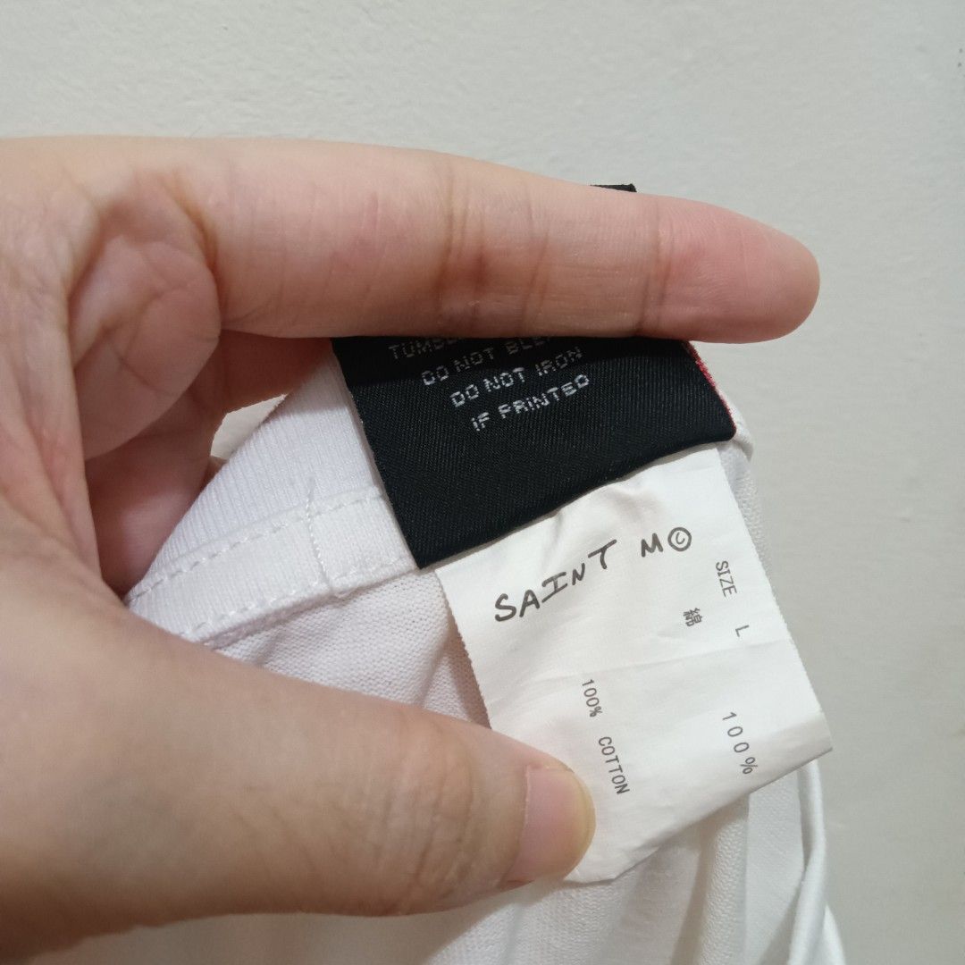 SAINT Spell Out Shirt (Category: Shirts) located in Caloocan City. Submitted by jaychingsss (Listing ID 1468398645, Image 3). Description: Saint Spell Out Shirt - 180 22x27 Makapal Tela Single Stitch Minor issue: may isang pinhole NEED WASH.
