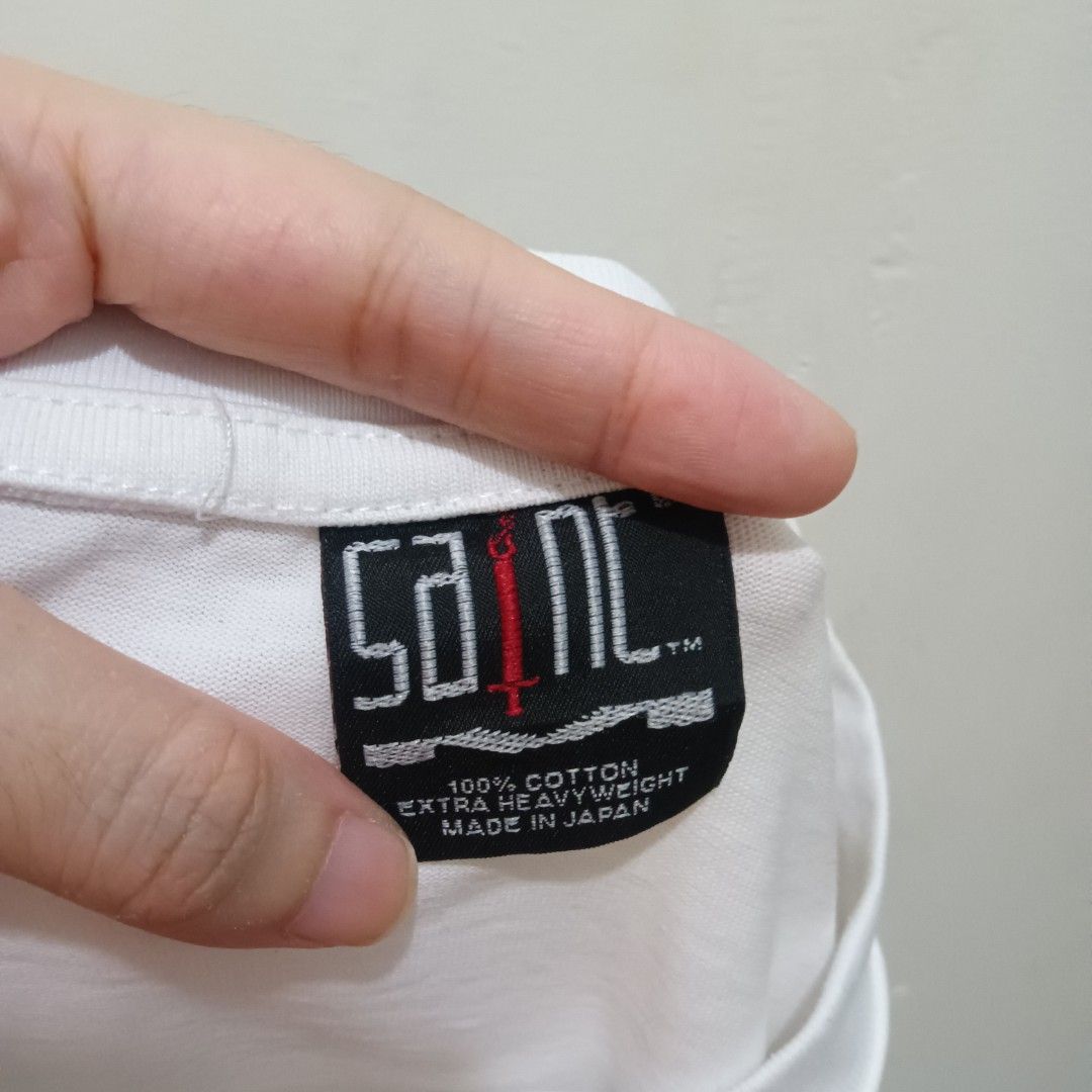 SAINT Spell Out Shirt (Category: Shirts) located in Caloocan City. Submitted by jaychingsss (Listing ID 1468398645, Image 2). Description: Saint Spell Out Shirt - 180 22x27 Makapal Tela Single Stitch Minor issue: may isang pinhole NEED WASH.