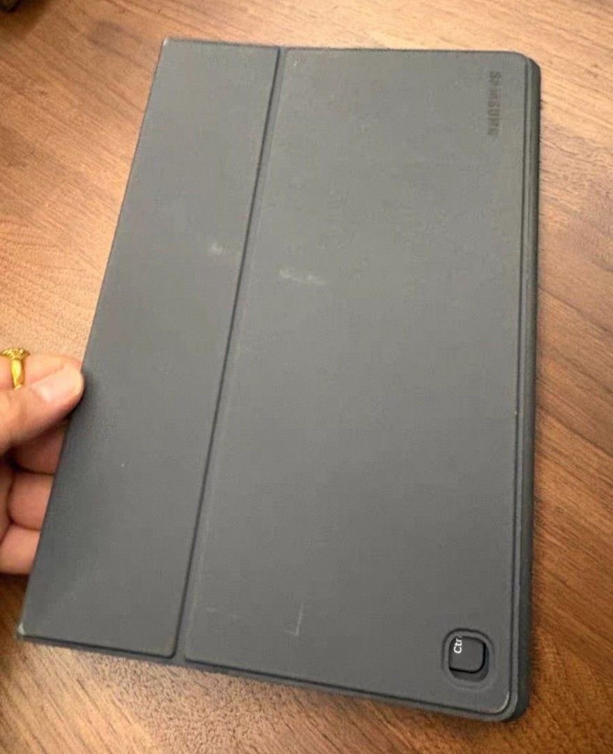 Samsung tab s5e keyboard original (Category: Others) located in Quezon City. Submitted by viflor (Listing ID 1468290548, Image 2). Description: - Original Samsung Galaxy Tab S5e keyboard and cover - Color: Dark gray - Slim, lightweight design that doubles as a stand - Fully functional keys and responsive layout - Good overall condition.