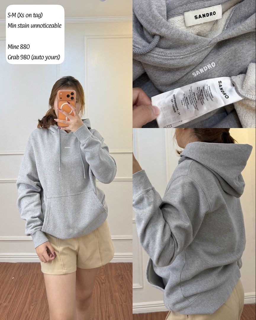 Sandro Grey Hoodie (Category: Hoodies) located in Manila. Submitted by angelll0123 (Listing ID 1468430237, Image 1). Description: - 100% Authentic Sandro grey hoodie - Size: Tagged XS, fits S to M comfortably (relaxed fit) - Features: Warm fleece lining, drawstring hood, and front pocket - Condition: Great everyday piece with a minor, barely noticeable stain near the pocket area.