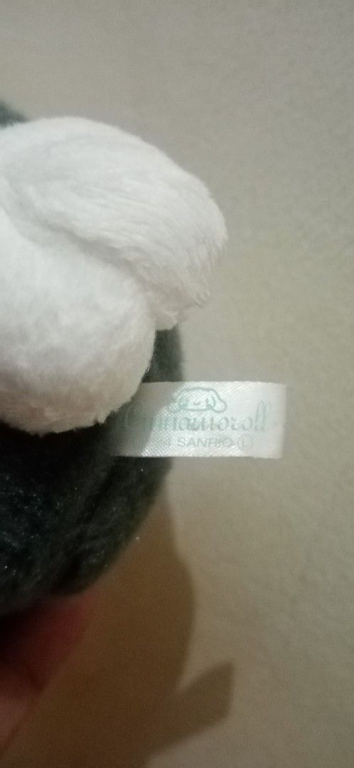 Sanrio Cinnamoroll Cat Onesie Plush (Category: Plushies & Soft Toys) located in Bulacan. Submitted by renasophiatoystore2020 (Listing ID 1468496132, Image 2). Description: - Authentic Sanrio Cinnamoroll plush doll - Adorable dark green cat costume design - Features white floppy ears, embroidered blue eyes, and pink paw pads - Comes with official tag attached - Clean fabric, carefully maintained by adult owner - Smoke-free and pet-free home.