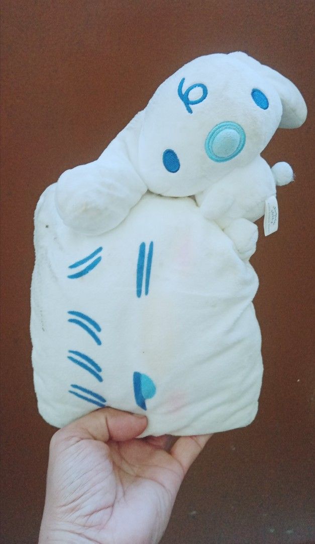 Sanrio Cinnamoroll Collaboration Plush Toy (Category: Plushies & Soft Toys) located in Bulacan. Submitted by renasophiatoystore2020 (Listing ID 1468496332, Image 1). Description: - Sanrio collaborative plush toy featuring Cinnamoroll and Hangyodon - Official © 2024 Sanrio tag included - Soft white plush material with light blue embroidery and blue stripes - Standard stuffed toy size - Pre-owned condition with slight handling marks.