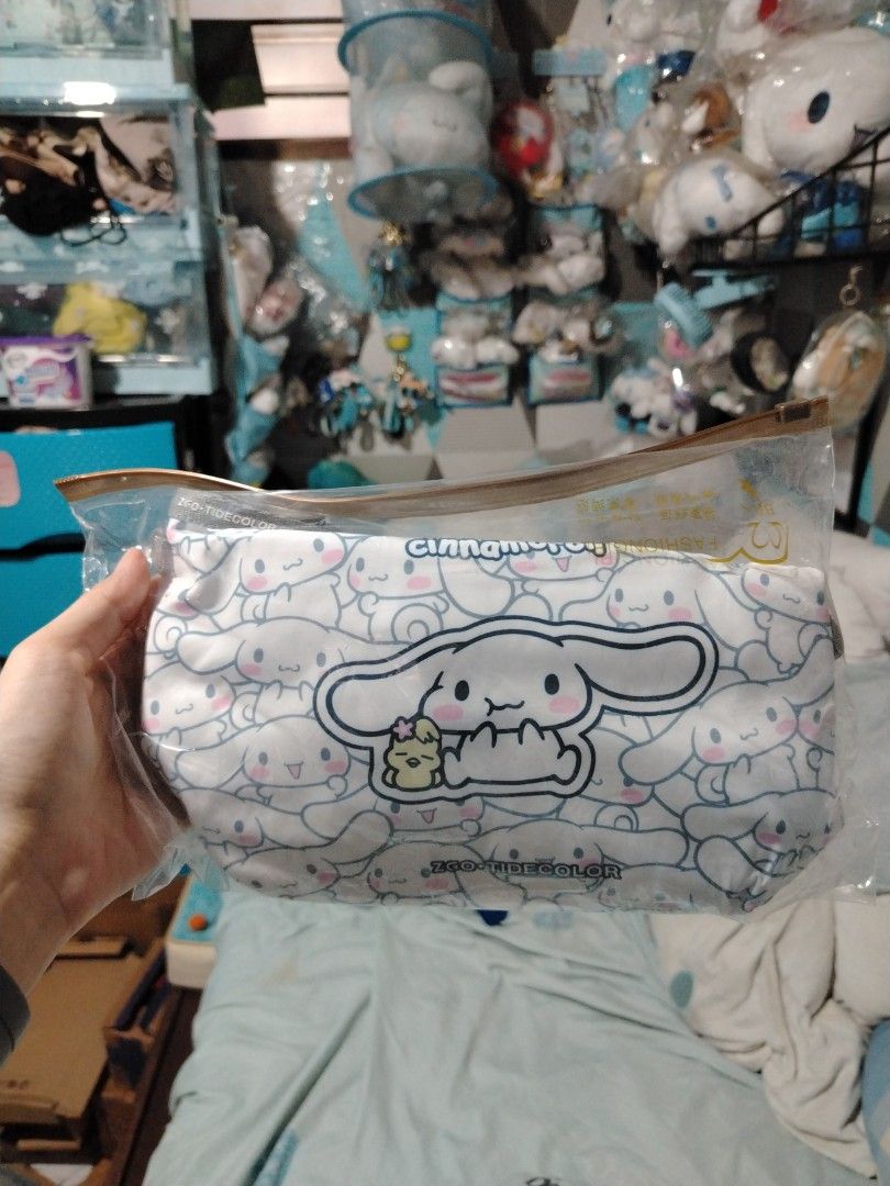 Sanrio Cinnamoroll Tote Bag ZGO TIDECOLOR (Category: Tote Bags) located in Manila. Submitted by joycechua439850 (Listing ID 1468302749, Image 1). Description: - 100% Authentic Sanrio Cinnamoroll merchandise - Cute all-over print on a white base with stylish grey straps - Features a handy front pocket with a larger Cinnamoroll patch - Secure top zipper closure to keep your belongings safe - Convenient interior zip pocket for small essentials - Bra