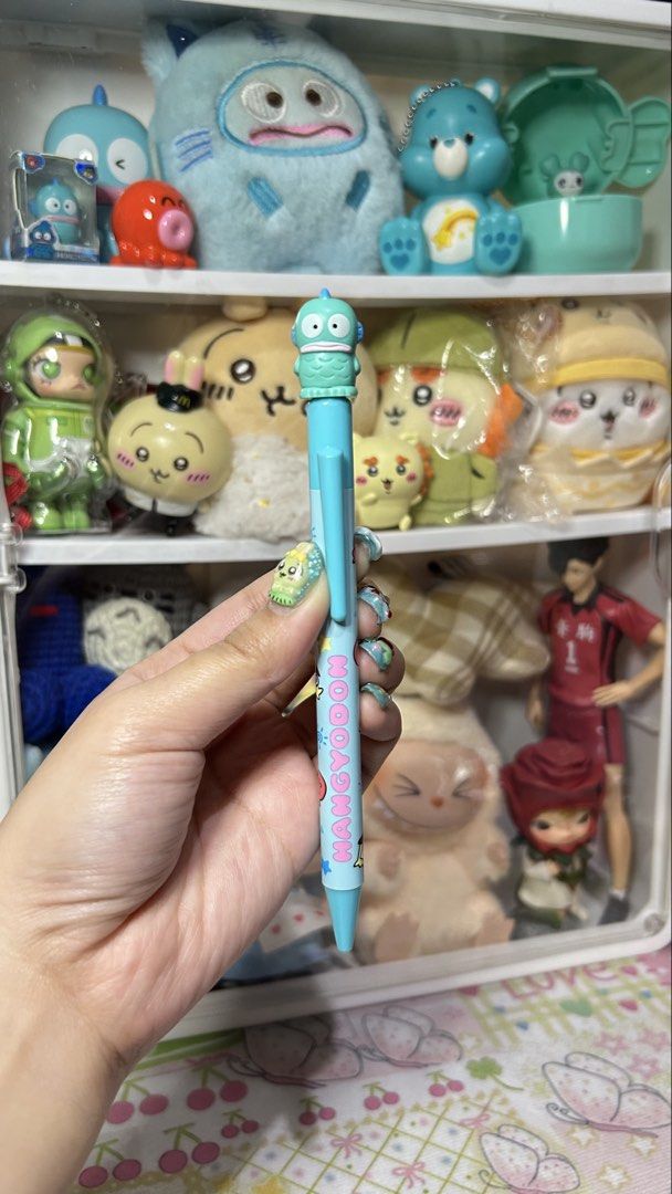Sanrio Hangyodon Character Ballpoint Pen (Category: Stationery & School Supplies) located in Manila. Submitted by yume_artsss (Listing ID 1468331295, Image 2). Description: - Authentic Sanrio Hangyodon ballpoint pen in light blue - Features an adorable Hangyodon topper and character barrel print - Twist-open mechanism for easy use - Standard pen size with smooth black ink - Brand new and ready to ship!.