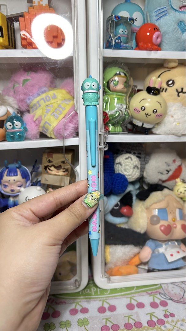 Sanrio Hangyodon Character Ballpoint Pen (Category: Stationery & School Supplies) located in Manila. Submitted by yume_artsss (Listing ID 1468331295, Image 1). Description: - Authentic Sanrio Hangyodon ballpoint pen in light blue - Features an adorable Hangyodon topper and character barrel print - Twist-open mechanism for easy use - Standard pen size with smooth black ink - Brand new and ready to ship!.