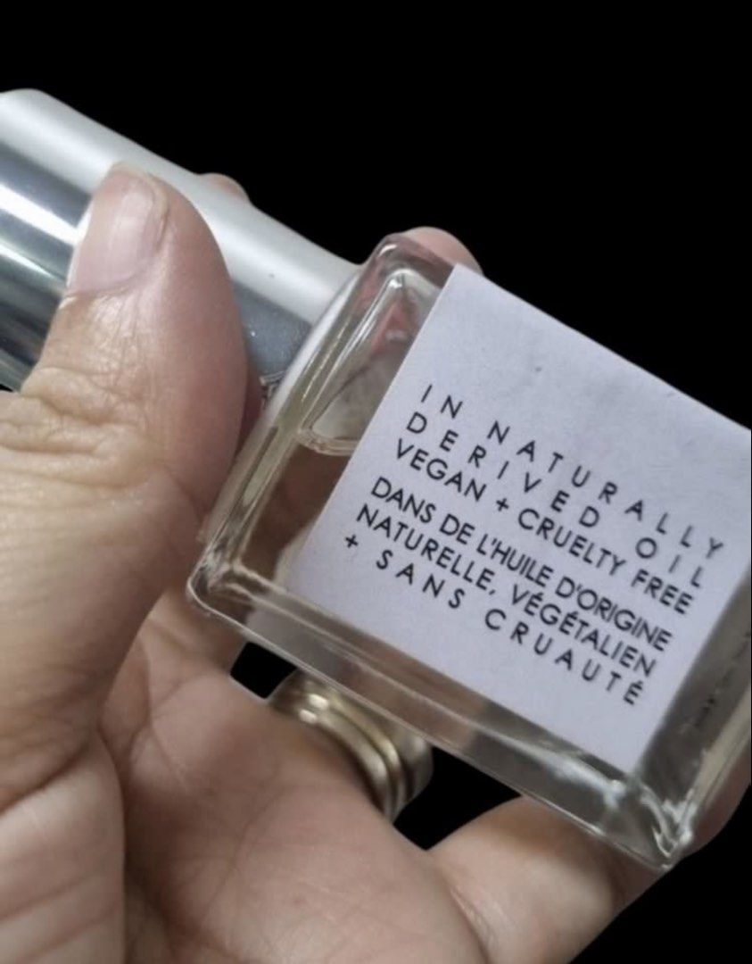 Santal Supreme Pure Perfume Roller 30 mL (Category: Fragrance & Deodorants) located in Quezon City. Submitted by kcobs (Listing ID 1468401488, Image 2). Description: - Product: Santal Supreme Pure Perfume Roller - Size: 30 mL - Formulation: Vegan, cruelty-free, with naturally derived oils - Application: Convenient rollerball format for easy daily touch-ups - Packaging: Glass bottle with metallic silver cap and clean B&W label - Condition: Full fi