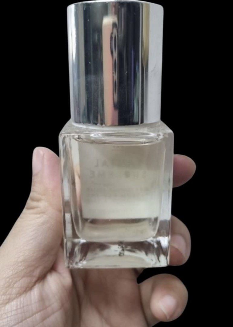 Santal Supreme Pure Perfume Roller 30 mL (Category: Fragrance & Deodorants) located in Quezon City. Submitted by kcobs (Listing ID 1468401488, Image 3). Description: - Product: Santal Supreme Pure Perfume Roller - Size: 30 mL - Formulation: Vegan, cruelty-free, with naturally derived oils - Application: Convenient rollerball format for easy daily touch-ups - Packaging: Glass bottle with metallic silver cap and clean B&W label - Condition: Full fi