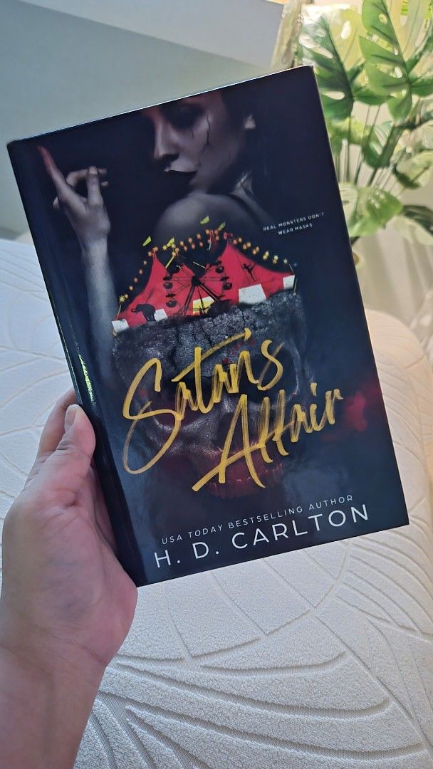 Satan's Affair by H.D. Carlton (Category: Storybooks) located in Mabalacat. Submitted by anjericaaa (Listing ID 1468331041, Image 1). Description: - Title: Satan's Affair by H.D. Carlton - Format: Hardcover with striking illustrated cover - Condition: Great, clean pages, solid spine. - Genre: Dark romance and thriller fiction - Perfect addition to any dark romance bookshelf.