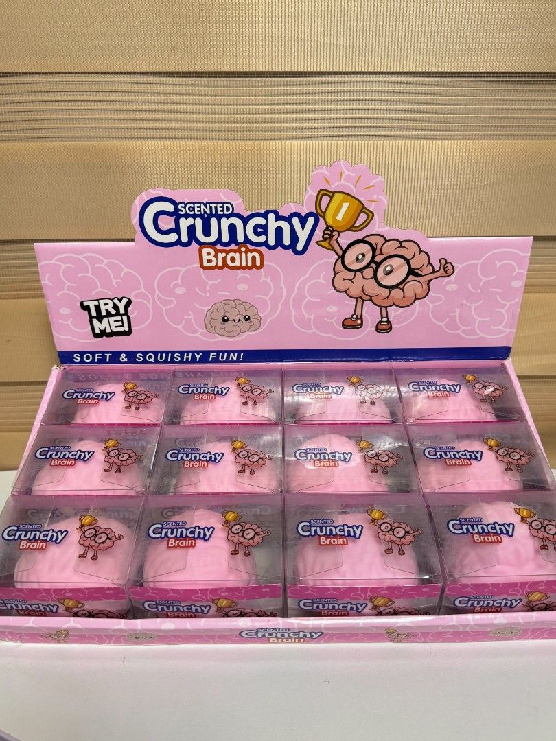 Scented Crunchy Brain Squishy Toy Pink (Category: Kids Toys) located in Pasay City. Submitted by clotheslinemanila (Listing ID 1468454940, Image 3). Description: - Product: Pink scented crunchy brain squishy toy - Condition: Brand new, unused stock from a display box - Texture: Soft, squishy, and fun to squeeze - Benefits: Great fidget toy and effective stress reliever - Packaging: Comes in an individual clear box with colorful display packaging.