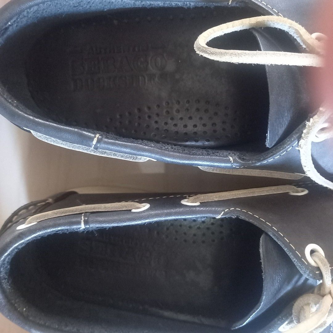 Sebago Docksides Leather Boat Shoes (Category: Casual Shoes) located in Baliuag. Submitted by happybday3 (Listing ID 1468318524, Image 3). Description: - Brand: Sebago Docksides - Color: navy - Material: Genuine leather upper - Style: Classic slip-on nautical boat shoes with white contrast stitching - Features: Signature red brand tag, non-marking rubber siped soles with excellent grip - Condition: Minimal wear on soles and uppers, well-maintaine