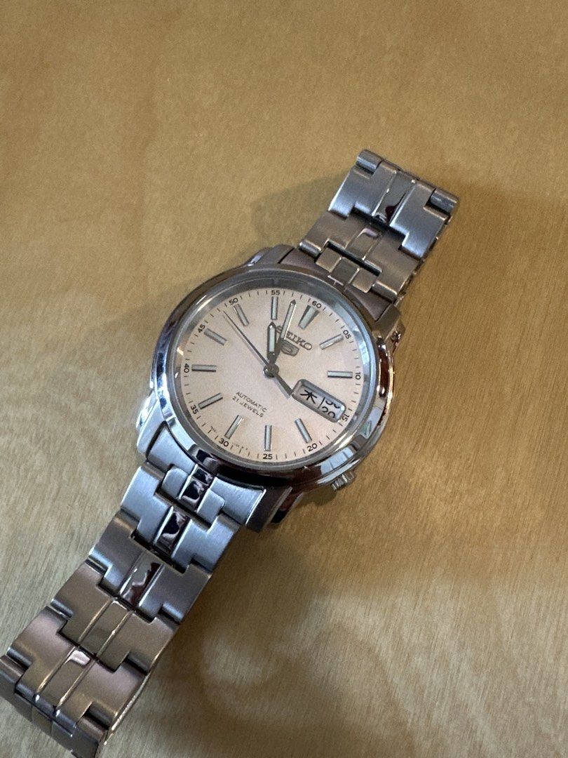 Seiko 5 Automatic SNKL75K1 (Unisex) (Category: Men's Watches) located in Pasig City. Submitted by cosmicjuice08 (Listing ID 1468307889, Image 3). Description: ⌚ Seiko 5 Automatic SNKL75K1 – White Dial - Like New | Used Once Clean, classic, and timeless. Featuring a crisp white dial, 38mm stainless steel case, and automatic movement, this Seiko 5 is perfect for everyday wear or smart casual occasions. ✅ Authentic Seiko 5 Automatic ✅ Elegant white 
