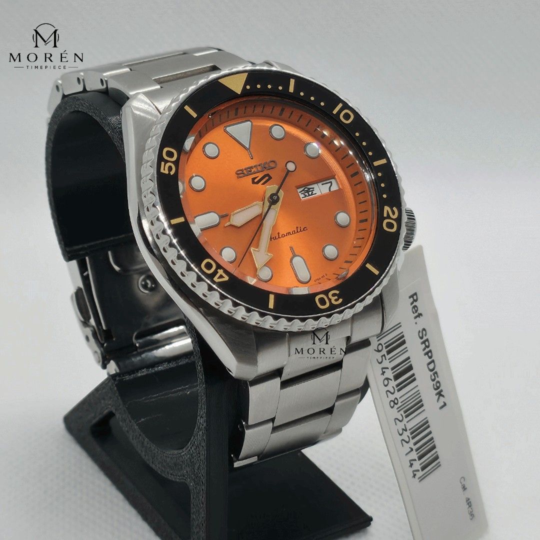 Seiko 5 Sports SRPD59K1 (Category: Men's Watches) located in Cebu City. Submitted by morentimepiece (Listing ID 1468434672, Image 3). Description: Bold orange. Timeless style. 🟠⌚ Seiko 5 Sports SRPD59 ✔️ 42.5mm Case Size ✔️ Automatic ✔️ English/Kanji Day-Date ✔️ Stainless Steel Bracelet ✔️ Iconic Orange Dial ✔️ Luminous Hours Another Feature: ✔️ Manual Winding Mall SRP: ₱20,000 + A standout piece for those who appreciate style and precision. 🤝 