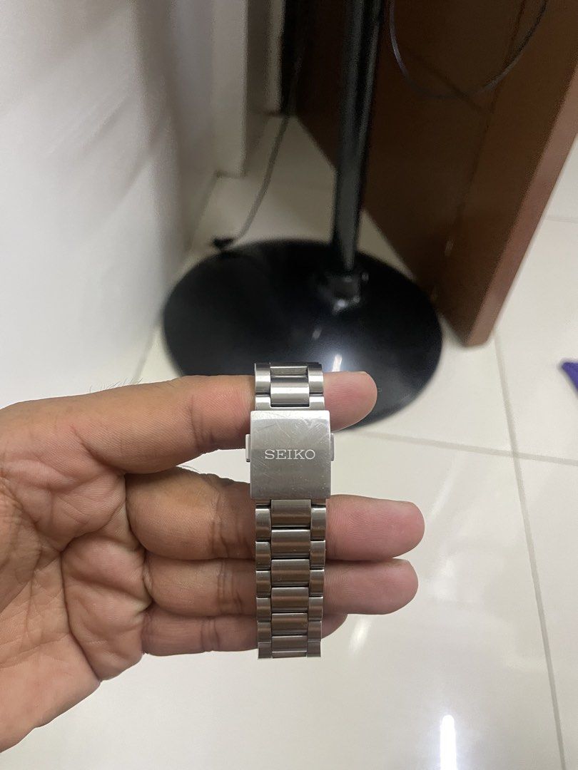 Seiko Prospex Speedtimer Solar Chronograph SSC813 (Category: Men's Watches) located in Manila. Submitted by jvkums (Listing ID 1468382927, Image 3). Description: - Brand/Model: Seiko Prospex Speedtimer Solar Chronograph - Dial/Bezel: White dial with black subdials and tachymeter bezel - Material: Stainless steel bracelet with folding clasp - Condition: Normal hairline scratches on the bracelet and clasp from regular use - Inclusions: Original gre