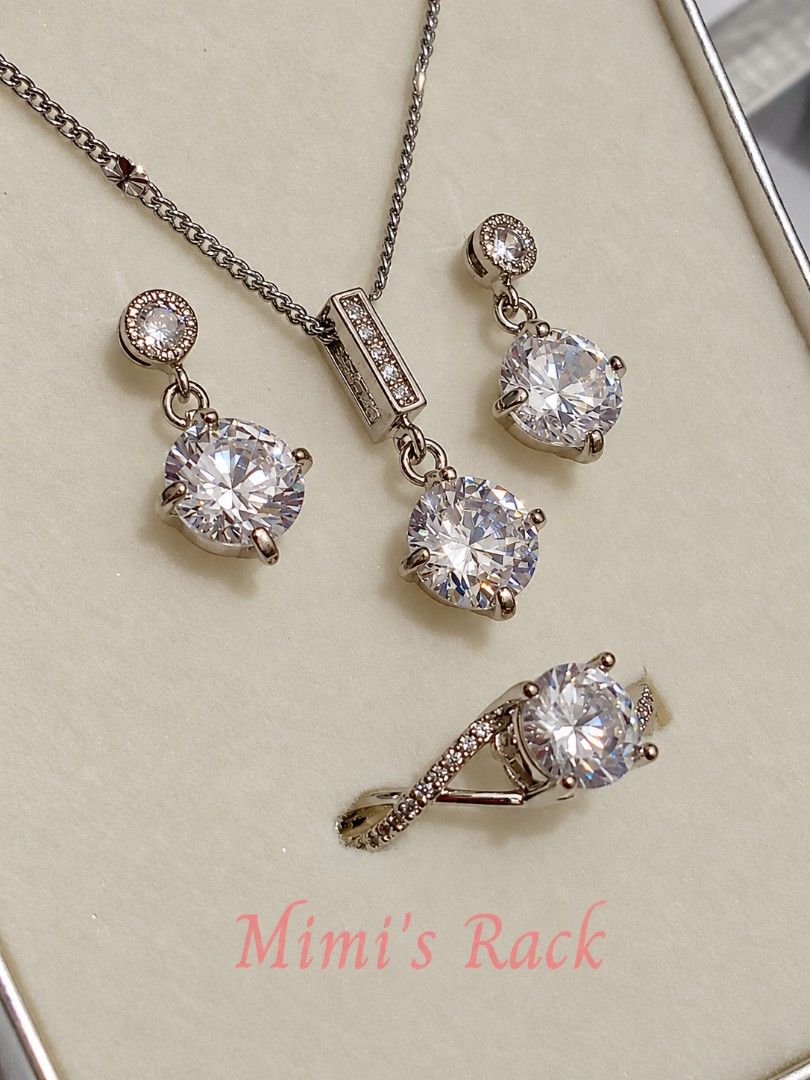 SET! Moissanite Necklace, Earrings & Ring Set (Category: Necklaces) located in Taguig. Submitted by mimisrack (Listing ID 1468353690, Image 3). Description: 🩶Shine beautifully with this elegant moissanite jewelry set featuring brilliant round stones in a sparkling silver-tone setting. The classic design, delicate accent stones, and graceful details make this set perfect for special occasions or adding a touch of glamour to your everyday look. 🤍
