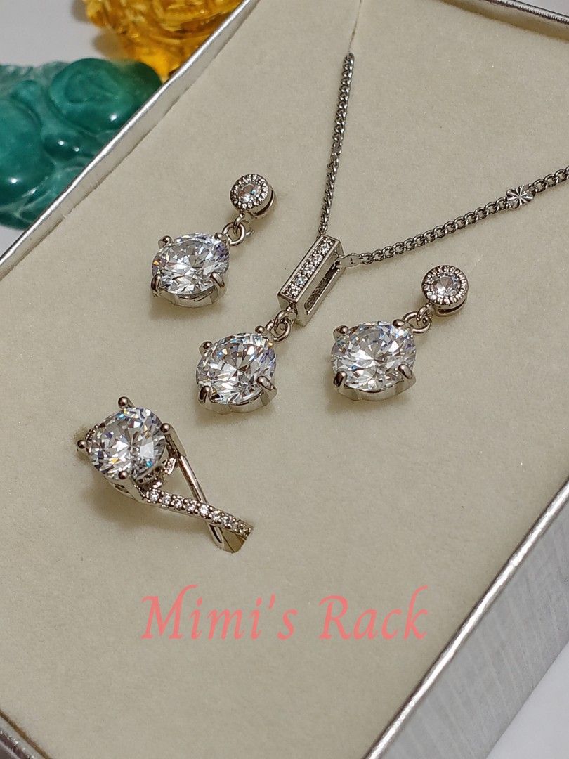 SET! Moissanite Necklace, Earrings & Ring Set (Category: Necklaces) located in Taguig. Submitted by mimisrack (Listing ID 1468353690, Image 2). Description: 🩶Shine beautifully with this elegant moissanite jewelry set featuring brilliant round stones in a sparkling silver-tone setting. The classic design, delicate accent stones, and graceful details make this set perfect for special occasions or adding a touch of glamour to your everyday look. 🤍