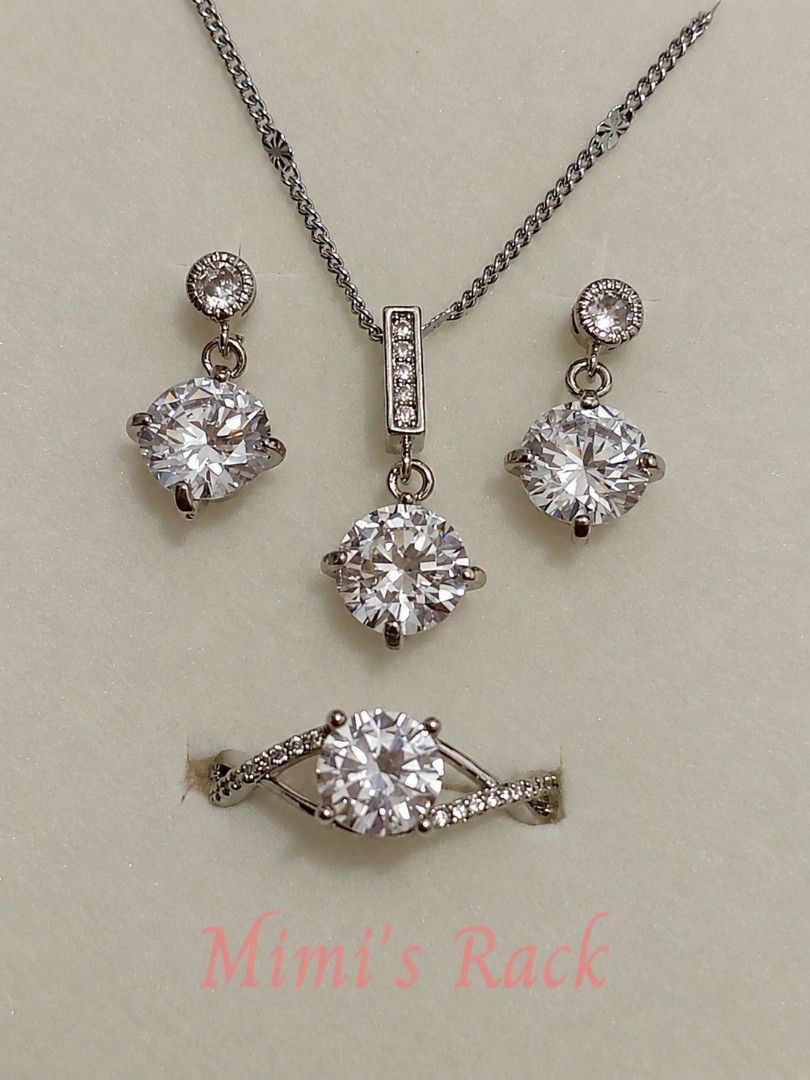 SET! Moissanite Necklace, Earrings & Ring Set (Category: Necklaces) located in Taguig. Submitted by mimisrack (Listing ID 1468353690, Image 1). Description: 🩶Shine beautifully with this elegant moissanite jewelry set featuring brilliant round stones in a sparkling silver-tone setting. The classic design, delicate accent stones, and graceful details make this set perfect for special occasions or adding a touch of glamour to your everyday look. 🤍