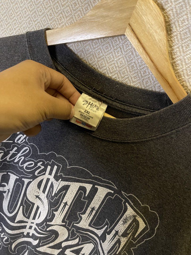 Shaka hustle 24/7 graphic tee (Category: Tshirts & Polo Shirts ) located in Manila. Submitted by hypestock_mnl (Listing ID 1468308301, Image 3). Description: - stylish - perfect for casual wear - great fit - in good condition - minimal signs of usage - 9/10 - money worth! - see pics for details/issue.