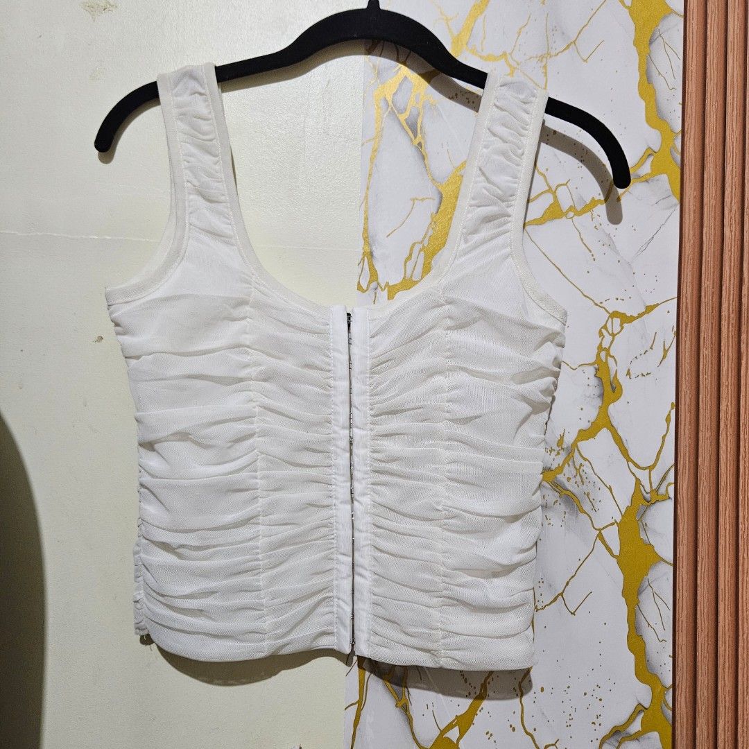 Shinestar White Mesh Ruched Zip-Front Tank Top corset medium (Category: Sleeveless) located in Digos. Submitted by marianfinds (Listing ID 1468330033, Image 2). Description: medium on tag ♡Authentic/preloved item. Actual photos posted. Please check all photos and details carefully before purchasing. Minor signs of use may be present. 📌Please manage your expectations this is not brandnew ●Color may vary due to lighting Walk in buyers are always w