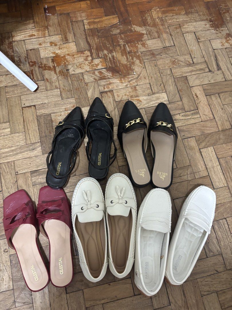 SHOE BUNDLE TAKE ALL (Category: Flats & Sandals) located in Makati City. Submitted by FashionFactory (Listing ID 1468375601, Image 2). Description: - Set of 5 pairs of women's flats, mules, and loafers - Trusted brands: Celestial, Miu Soles, and Parisian - Styles include: black pointed slingbacks, black chain mules, red square toe slip-ons, beige tassel loafers, and white loafers - Various colors and sizes included in the bundle - Ideal for every