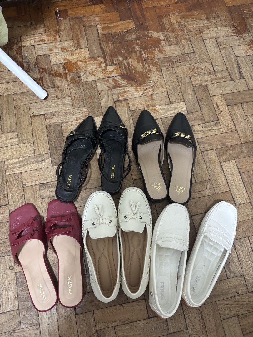 SHOE BUNDLE TAKE ALL (Category: Flats & Sandals) located in Makati City. Submitted by FashionFactory (Listing ID 1468375601, Image 1). Description: - Set of 5 pairs of women's flats, mules, and loafers - Trusted brands: Celestial, Miu Soles, and Parisian - Styles include: black pointed slingbacks, black chain mules, red square toe slip-ons, beige tassel loafers, and white loafers - Various colors and sizes included in the bundle - Ideal for every