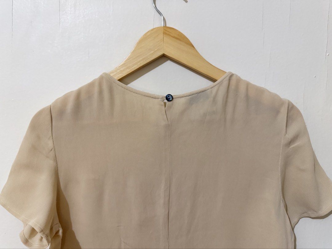 Short Sleeve Blouse (Category: Blouses) located in Subic. Submitted by ciesells (Listing ID 1468432648, Image 3). Description: Bust: 36 (med) - With washable stain in front - Design: Short sleeves, round neckline, back keyhole with a single button closure - Lightweight, breathable, flowy fabric.