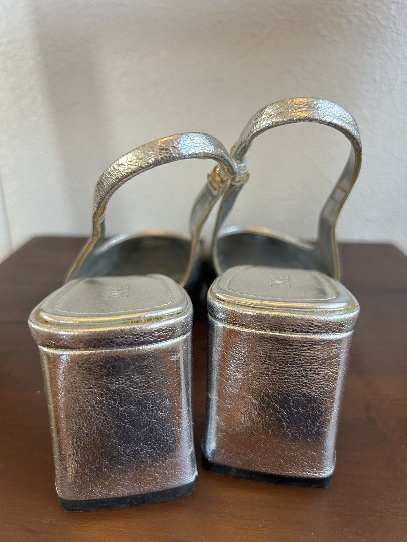 Silver slingback heels (Category: Heels) located in Quezon City. Submitted by patvluspo (Listing ID 1468347409, Image 3). Description: It’s simple and elegant. Easy to match any outfit. Reason for selling: quite uncomfortable for my feet. .