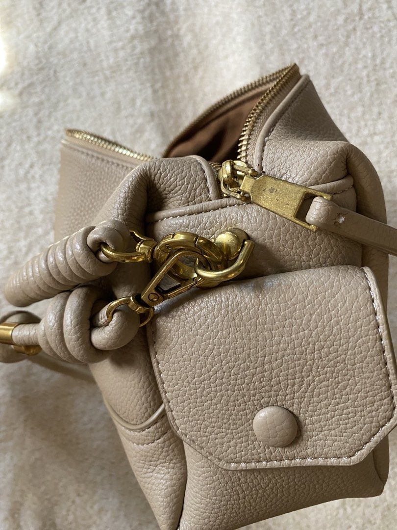 Sling, shoulder bag Pony Pony pebbled leather (Category: Shoulder Bags) located in Trece Martires City. Submitted by reloveandrestyle (Listing ID 1468331763, Image 3). Description: -pebbled leather -barely used -zipper minor scratches only -thailand pasabuy (OG price 2700) -sling bag can be shoulder bag too -super pretty in actual.