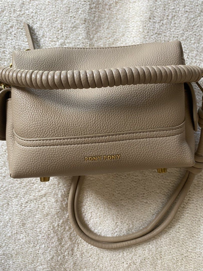Sling, shoulder bag Pony Pony pebbled leather (Category: Shoulder Bags) located in Trece Martires City. Submitted by reloveandrestyle (Listing ID 1468331763, Image 2). Description: -pebbled leather -barely used -zipper minor scratches only -thailand pasabuy (OG price 2700) -sling bag can be shoulder bag too -super pretty in actual.