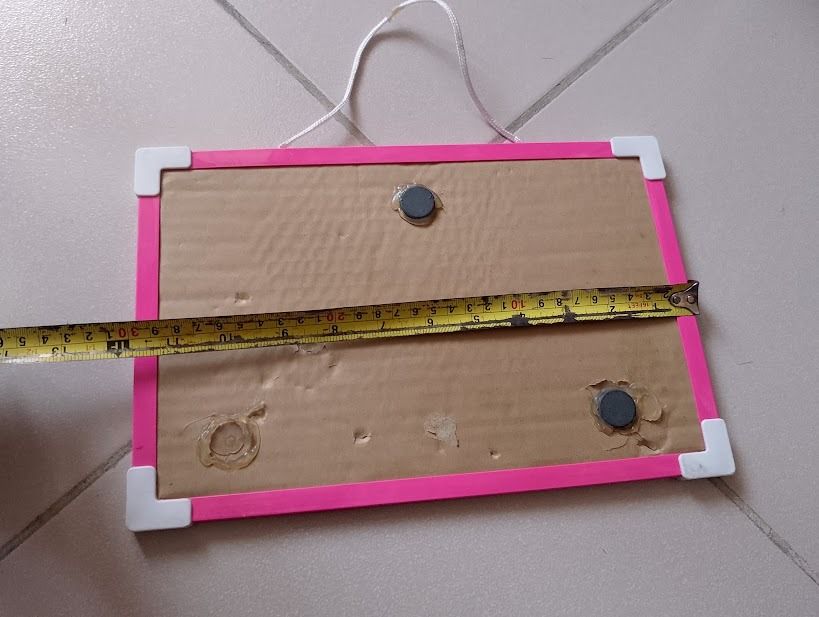 Small Whiteboard with Pink Frame and Hanging String (Category: Stationery & School Supplies) located in Quezon City. Submitted by susmaryosep1 (Listing ID 1468349616, Image 2). Description: - Portable mini whiteboard - Bright pink plastic frame with white corner guards - Measures approximately 20 cm wide - Includes a convenient white hanging string - Clean and smooth writing surface 300.