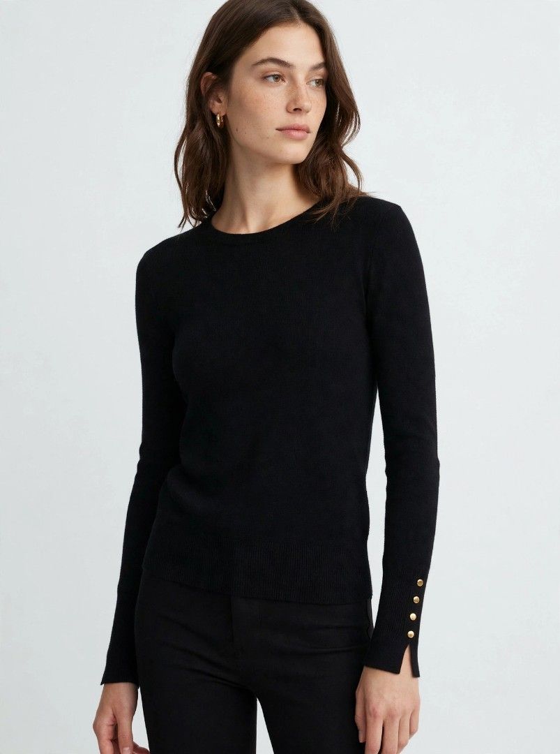 Small Zara Knit Sweater with Gold Details (Category: Others Tops) located in Castillejos. Submitted by lalainecloset22 (Listing ID 1468362721, Image 1). Description: - Brand: Zara - Size: Small (EUR S / USA S) - Color: Classic Black - Material: Comfortable knit fabric - Features: Elegant gold-tone button details on sleeve cuffs - Condition: Excellent, well-maintained.