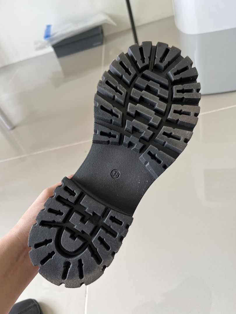SOFAB | Black Loafers Size 38 (Category: Loafers) located in Mandaluyong City. Submitted by bravedeer.020ad7 (Listing ID 1468310833, Image 3). Description: - Style: Classic slip-on penny loafers with chunky platforms and thick lug soles - Color/Finish: Glossy black patent - Size: EU 38 - Condition: Excellent, with clean insoles and very minimal wear on the tread - Perfect for: Daily wear, school outfits, or styling with cute socks and skirts.