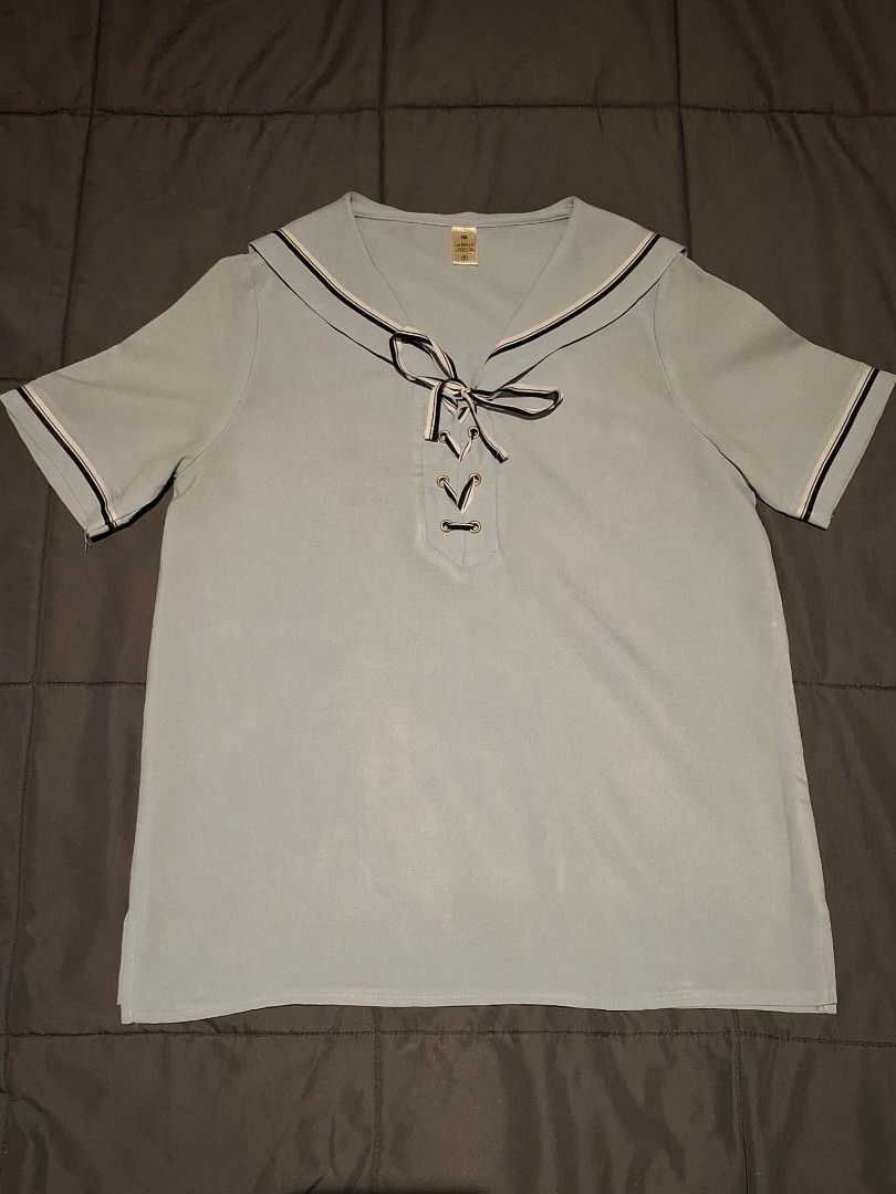 soft blue lace up sailor collar blouse (Category: Blouses) located in Paranaque City. Submitted by rilkeanheart (Listing ID 1468418787, Image 1). Description: *read bio before inquiring please! let's respect each other's time - fits s-m - w 18in l 23in - jfashion staple! can make so many cute outfit combos w this - light neutral blue color in person (see last pic w better lighting) - some faded spots with minor discoloration/fading, barely notice