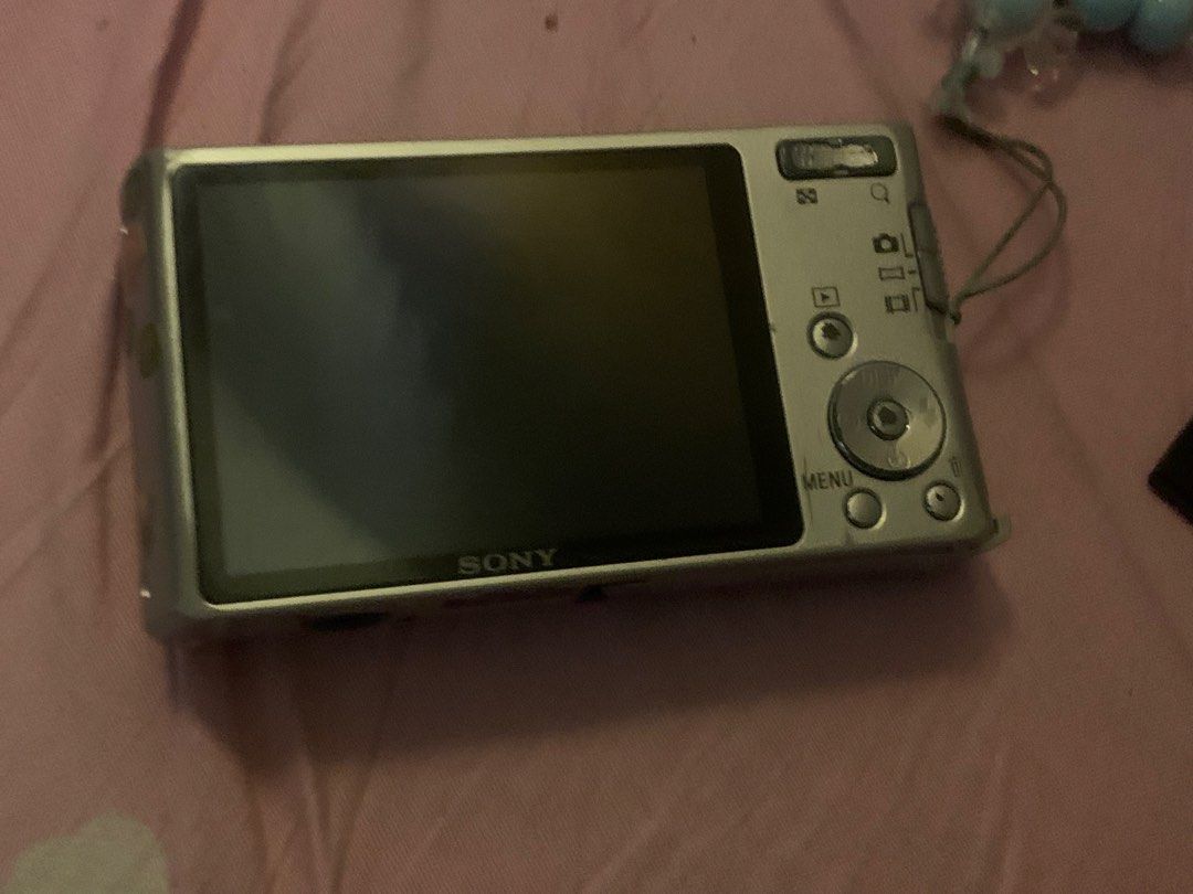 Sony Cybershot 14.1 Megapixels Digital Camera Customized Decor (Category: Cameras) located in Taguig. Submitted by angel_xenin (Listing ID 1468449920, Image 2). Description: - 14.1 Megapixels Sony digital camera - Features a Carl Zeiss Vario Tessar lens for great image quality - Unique aesthetic with custom stickers and paper prints all over the body - Fully tested, powers on, and shoots amazing vintage-style photos - Includes a memory card, batt