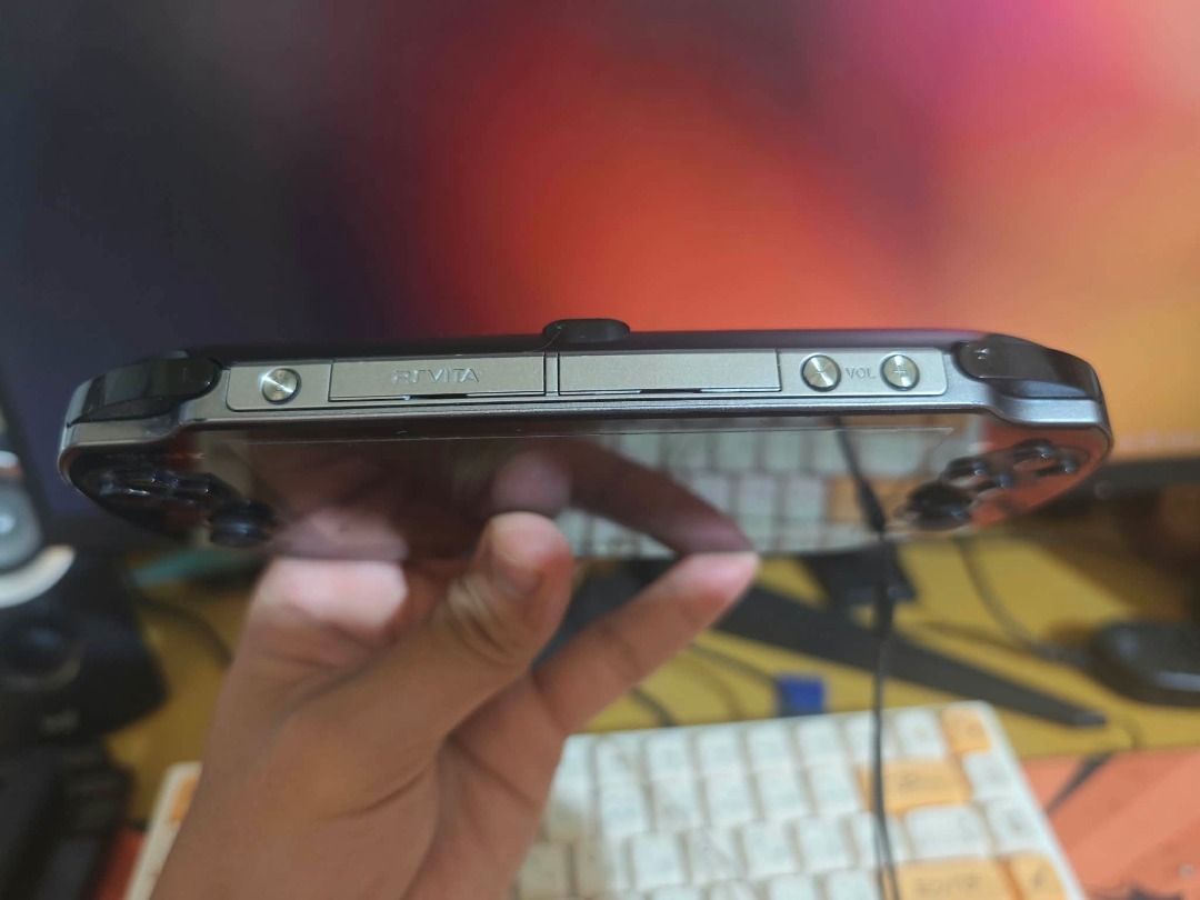 Sony PS Vita PCH-1002 Handheld Console (Category: PlayStation) located in Antipolo. Submitted by rrdatario (Listing ID 1468485642, Image 3). Description: - Model: Sony PS Vita PCH-1002 (Black) - Software: System software 3.74, tested and fully working - Storage: Built-in memory with approx. 7.5GB capacity - Condition: Pristine - Functionality: Dual analog sticks, physical buttons, triggers, rear touchpad, and charging port are all fully functiona
