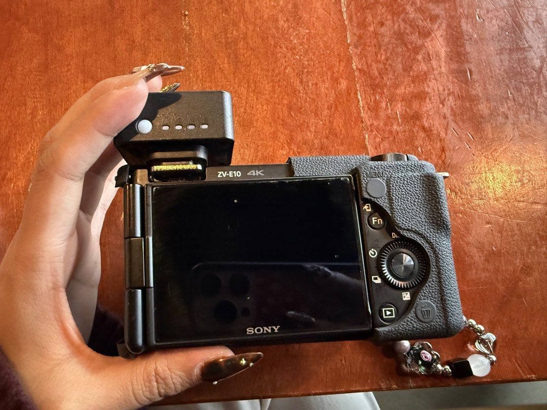 Sony ZV-E10 4K Mirrorless Camera with 16-50mm Lens (Category: Cameras) located in Baguio. Submitted by reeshlei (Listing ID 1468444023, Image 2). Description: - Sony ZV-E10 camera - Includes furry windscreen and sakura hot shoe cover - Comes with 1 external flash - Includes bag, camera strap, and silicone case - Original box and receipt included - SD CARD NOT INCLUDED!!! - shutter count 3350 female owned rfs: upgraded and rarely used.