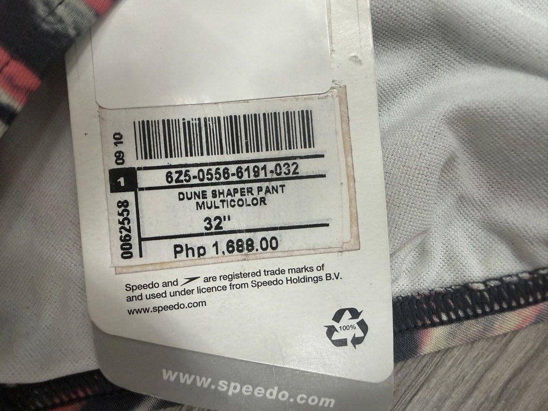 Speedo Dune Shaper Pant Bikini Bottom Size 32 Multicolor (Category: Bikinis & Swimsuits) located in Pasig City. Submitted by jeymi88 (Listing ID 1468409256, Image 2). Description: - Brand: Speedo Dune Shaper Pant - Size: 32 inches - Design: Abstract wave pattern in black, pink, grey, and yellow with a solid black folded waist detail - Condition: Brand new, unworn, with original hangtag attached (PHP pricing shown) - Perfect for swimming or beach 