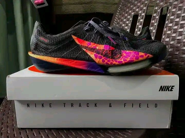 Spike shoes (Category: Announcements) located in Masbate. Submitted by zealrabbit_89f266 (Listing ID 1468317959, Image 2). Description: 🔥 FOR SALE: NIKE AIR ZOOM VICTORY 2 GLAM 🔥 🏃‍♂️ Looking for stylish racing spikes? Here's your chance to own the Nike Air Zoom Victory 2 Glam! With its eye-catching black, pink, orange, and purple design, you'll surely stand out on the track. 💯 ✅ Brand: Nike ✅ Model: Air Zoom Victory 2 Glam ✅ Color: Black / M