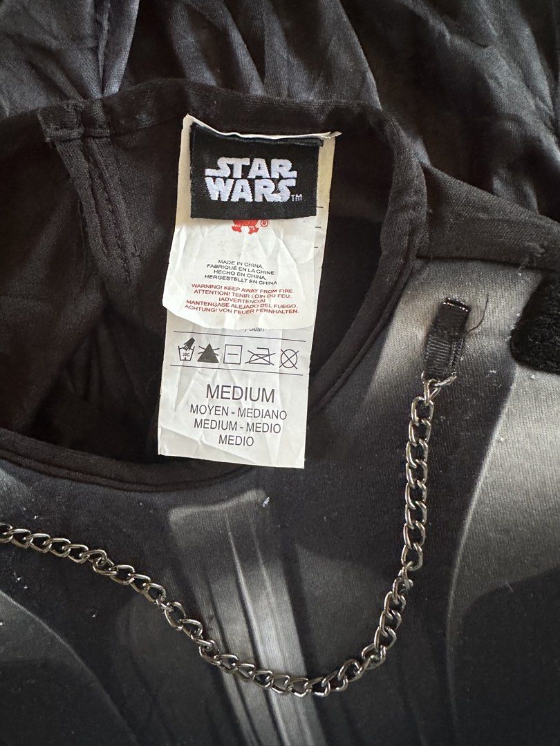 Star Wars Darth Vader Costume Size Medium (Category: Babies & Kids Fashion) located in Muntinlupa City. Submitted by belica (Listing ID 1468336148, Image 3). Description: - Authentic Star Wars Darth Vader costume (Size Medium) - Includes black jumpsuit with attached molded chest piece and shoulder guards - Features printed control panel, belt, and boot tops - Official Star Wars tag on the inside collar - Perfect for Halloween parties, cosplay, an
