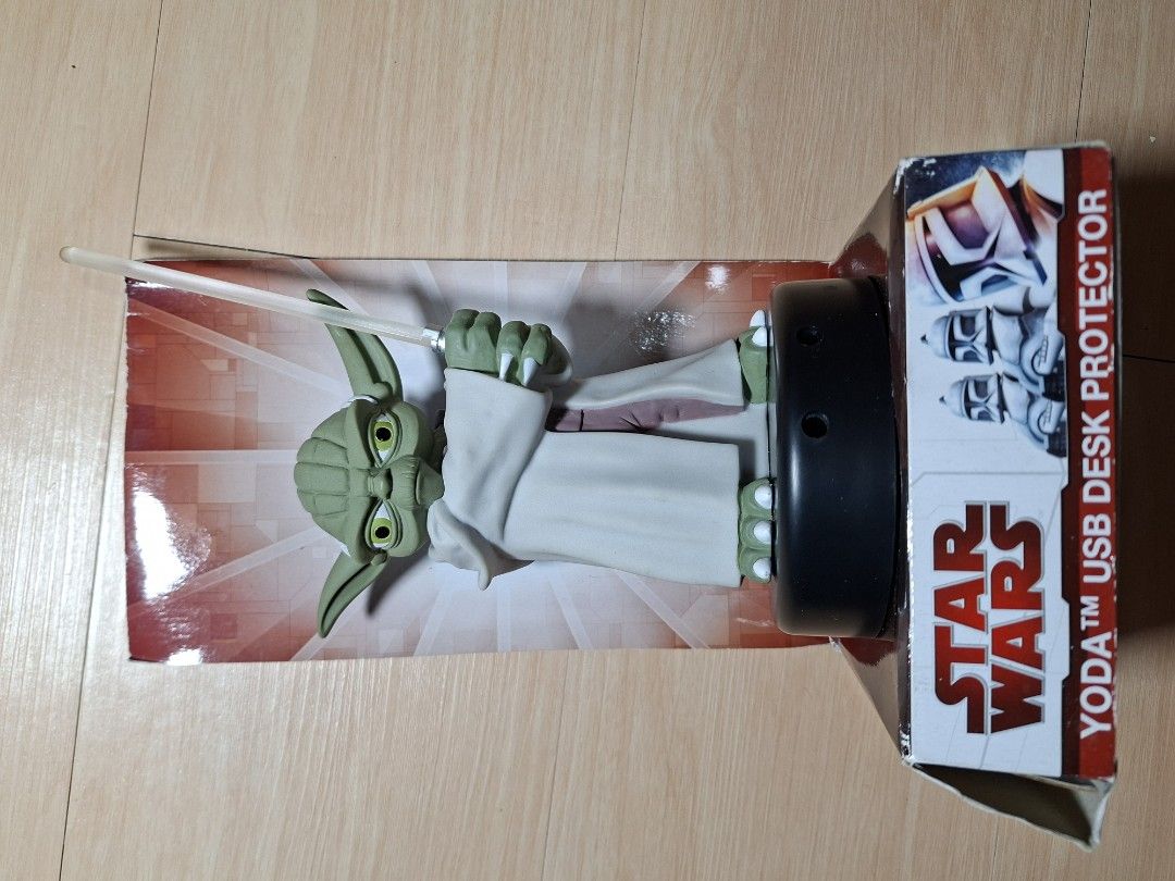 Star Wars Yoda USB Desk Protector Interactive Master Yoda Figure (Category: Figurines & Statues) located in Baguio. Submitted by restyrille77846 (Listing ID 1468315112, Image 3). Description: - Official Star Wars Yoda USB desk toy with original box and packaging - Motion-activated feature triggers light and sound - Lightsaber actually illuminates when activated - Speaks six different iconic Yoda phrases - Conveniently USB powered for your desk se