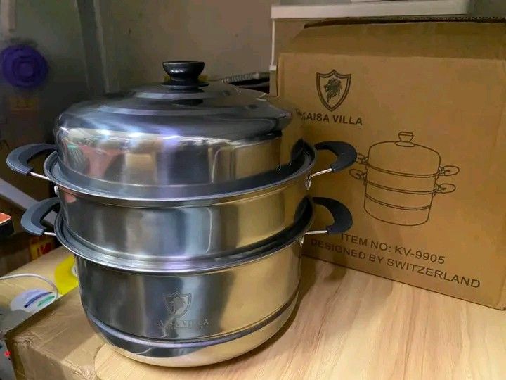 STEAMER 3 LAYER (Category: Cookware & Accessories) located in Manila. Submitted by berdenmarl01688 (Listing ID 1468483809, Image 2). Description: - Stainless steel 3-tier steamer pot set, Model KV-9905 - Diameter: 26cm - Complete set: Base steamer pot, second steamer tier, two steamer plates, and lid cover - Sturdy handles on pot and tiers for safe and easy lifting - Multi-layer cooking design to steam multiple dishes simultaneously - Original bo