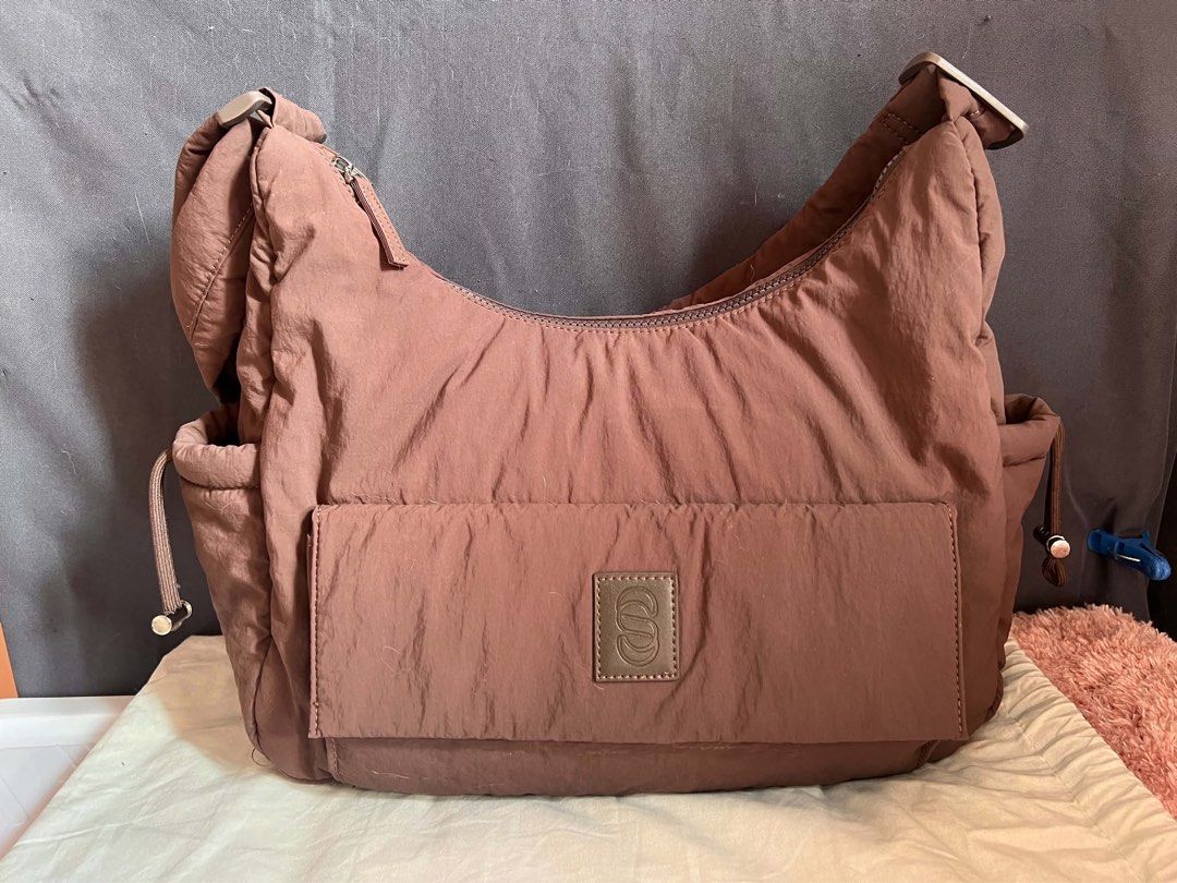 Straightforward Sapporo Sling Bag (Category: Shoulder Bags) located in Manila. Submitted by nlgll (Listing ID 1468413911, Image 1). Description: Why did we use DryTech fabric? Our DryTech fabric is durable, lightweight, and water-resistant Perfect for the changing seasons and ideal for outdoor activities. Why did we design this? Designed for the urban narrative, Sapporo Sling is built for those who make the city their own. Compact, versatile, and