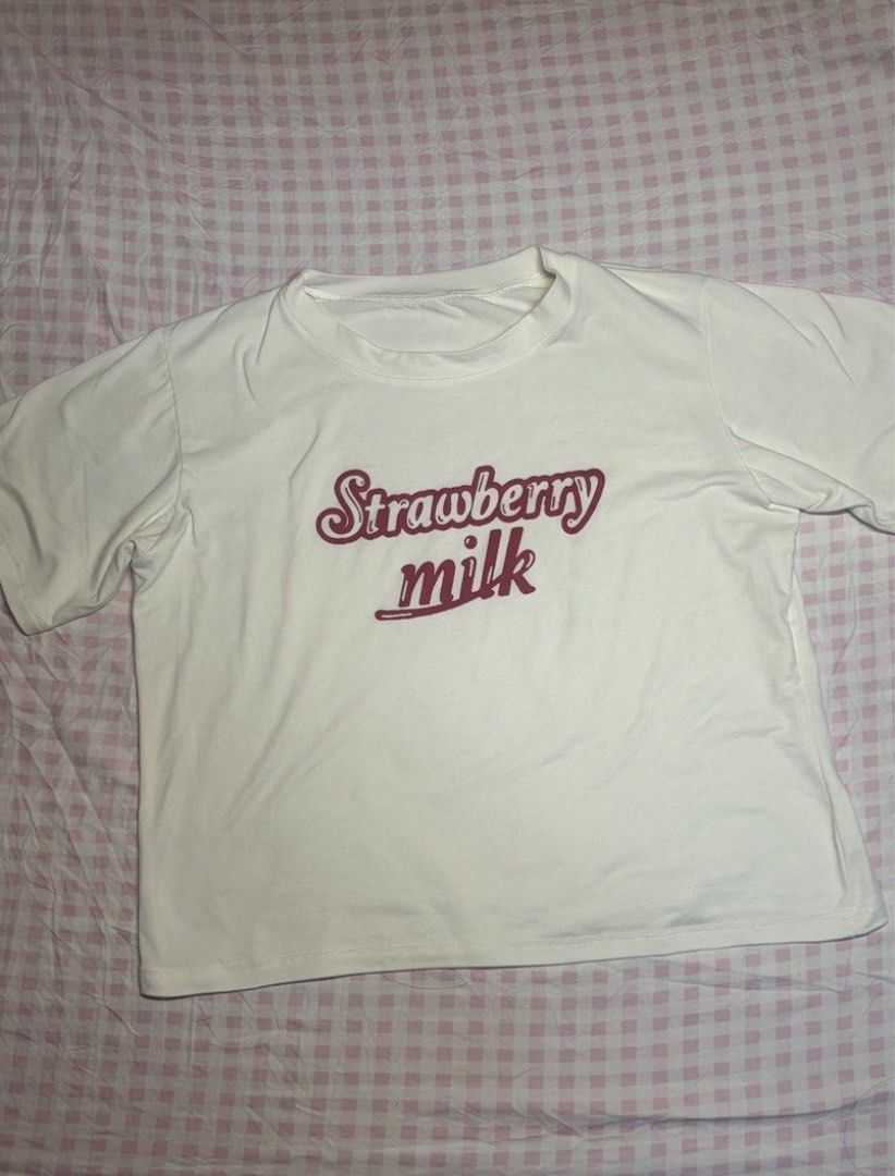 Strawberry Milk Statement Shirt (Category: Shirts) located in San Juan City. Submitted by angel_aura_archive (Listing ID 1468331707, Image 1). Description: - Free size - All of the details are here n po so pls matuto po magbasa and no to low bailers!! I can give discount if marami po kukunin. They are not from ukay and they are from my personal collection from my closet (purpose is to declutter)..