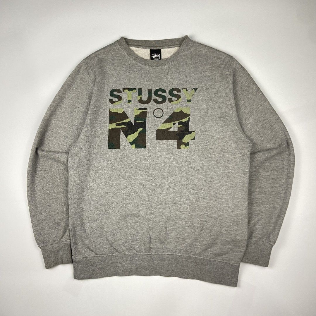 Stüssy N4 Spell-out Camo Script Crewneck (Category: Coats, Jackets and Outerwear) located in Antipolo. Submitted by lootersclubph (Listing ID 1468445945, Image 2). Description: Stüssy N4 Spell-out Camo Script Crewneck Medium 28 Length / 22.5 Width Issue / s : Minimal Hairlines only. Washed and Steamed 100% Authentic ₱ 1,499 negotiable.