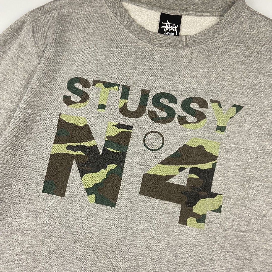 Stüssy N4 Spell-out Camo Script Crewneck (Category: Coats, Jackets and Outerwear) located in Antipolo. Submitted by lootersclubph (Listing ID 1468445945, Image 3). Description: Stüssy N4 Spell-out Camo Script Crewneck Medium 28 Length / 22.5 Width Issue / s : Minimal Hairlines only. Washed and Steamed 100% Authentic ₱ 1,499 negotiable.