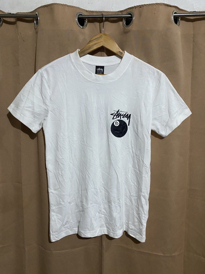Stussy 8 Ball White Tee (Category: Tshirts & Polo Shirts ) located in Manila. Submitted by why_notph (Listing ID 1468420940, Image 1). Description: - Brand: Stussy - Item: Classic 8-ball graphic t-shirt - Color: White - Size: Small - Material: 100% cotton (Made in Mexico) - Condition: Clean fabric, solid streetwear staple - Care: Machine wash cold - Dimensions: 25x18.