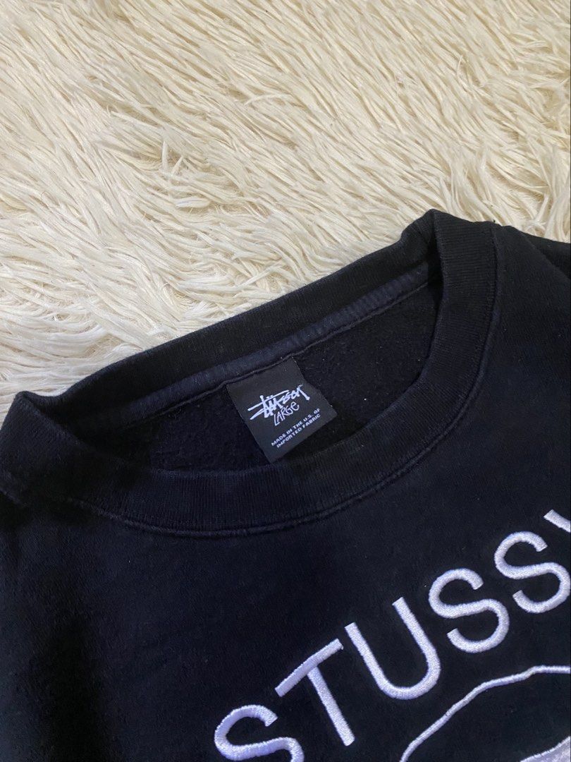 Vintage Stussy Embroidered sweater (Category: Coats, Jackets and Outerwear) located in Antipolo. Submitted by switchneighborhood (Listing ID 1468294901, Image 3). Description: - Brand: Stussy - Style: World Tour Crewneck Sweatshirt - Color: Classic Black - Size: Large (L) - Material: 80% Cotton, 20% Polyester blend - Details: Front embroidered World Tour graphics (NYC, LA, Tokyo, London, Paris), ribbed collar, cuffs, and hem - Condition: Clean, e