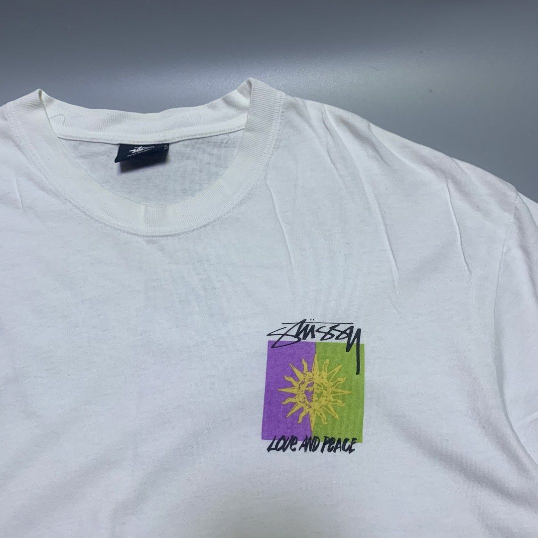 STUSSY LOVE & PEACE TEE (Category: Tshirts & Polo Shirts ) located in Cabanatuan. Submitted by _w2keed (Listing ID 1468476659, Image 3). Description: Size: XL (W22' x L29') Condition: 9.8/10 Color rate: 9.5/10 Issue/s: need rewash.